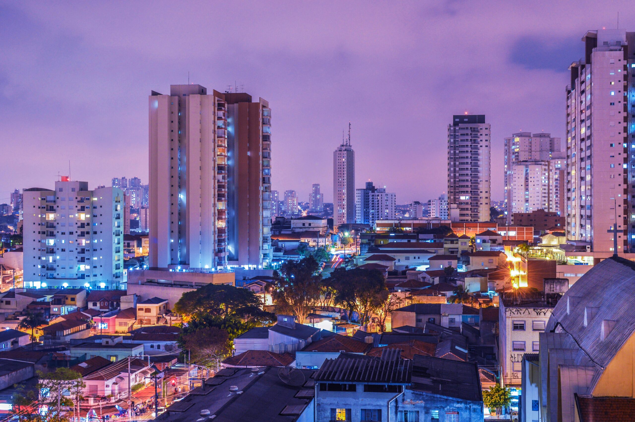 Stunning view of Sao Paulo's illuminated skyline showcasing vibrant nightlife and towering skyscrapers.